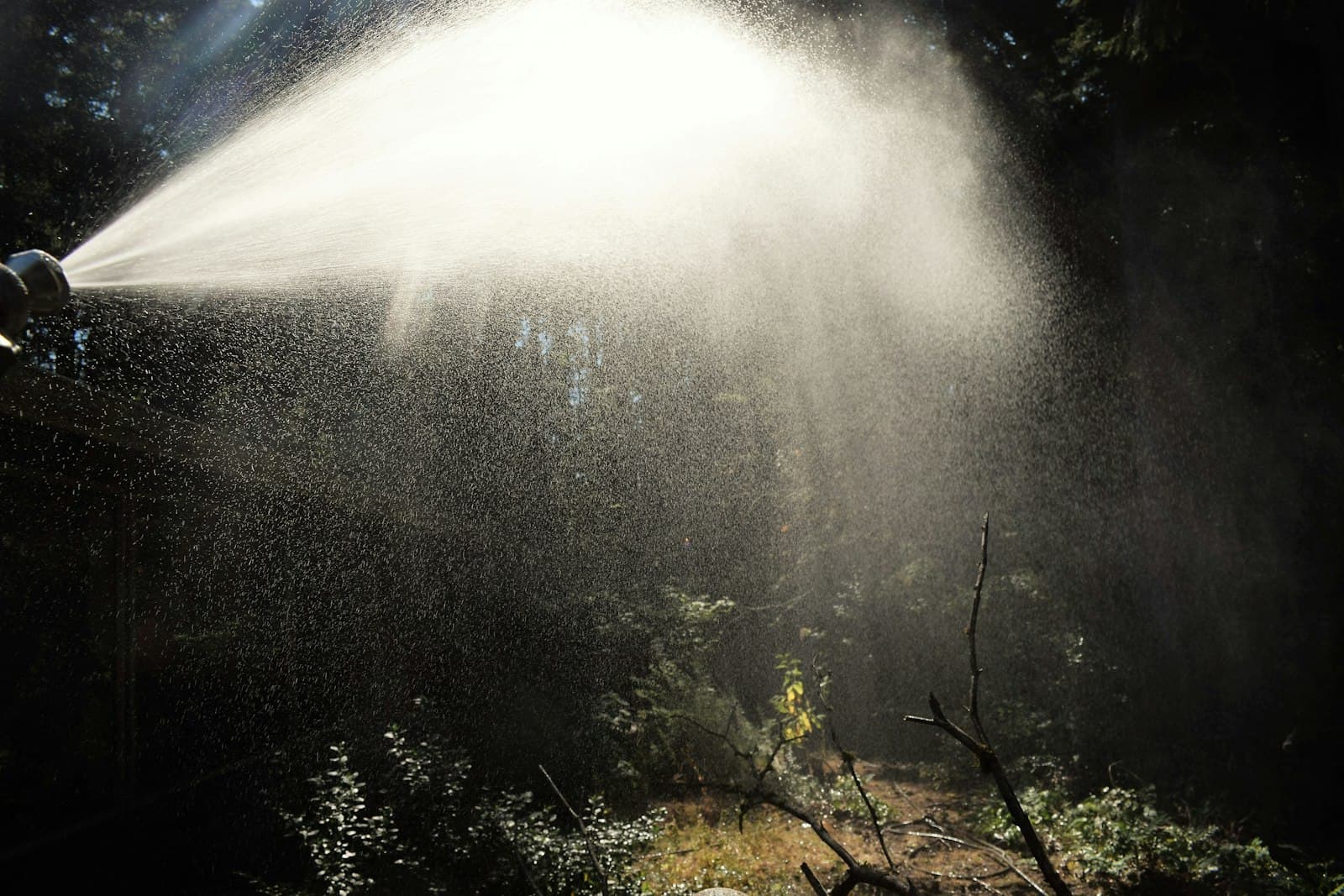 High-pressure water spray from a nozzle